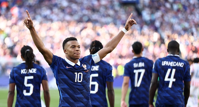 France's forward #10 Kylian Mbappe celebrates scoring his team's first goal during the 2026 World Cup round of 16 football match between Paraguay and France at the Philadelphia Stadium in Philadelphia on July 4, 2026.  (Photo by CHARLY TRIBALLEAU / AFP)